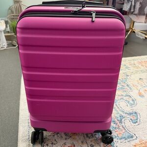 Calpak Vibrant pink Rolling Suitcase
